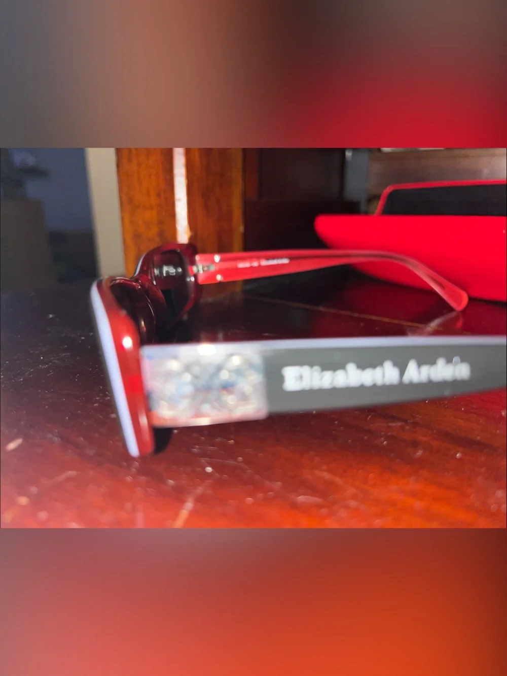 Elizabeth Arden Black Rectangular Sunglasses with Red Accents